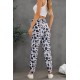 Drawstring Elastic Waist Cow Print Pants